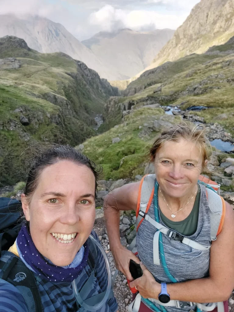 Ros and a walker enjoying a bespoke guided walk in the Lake District