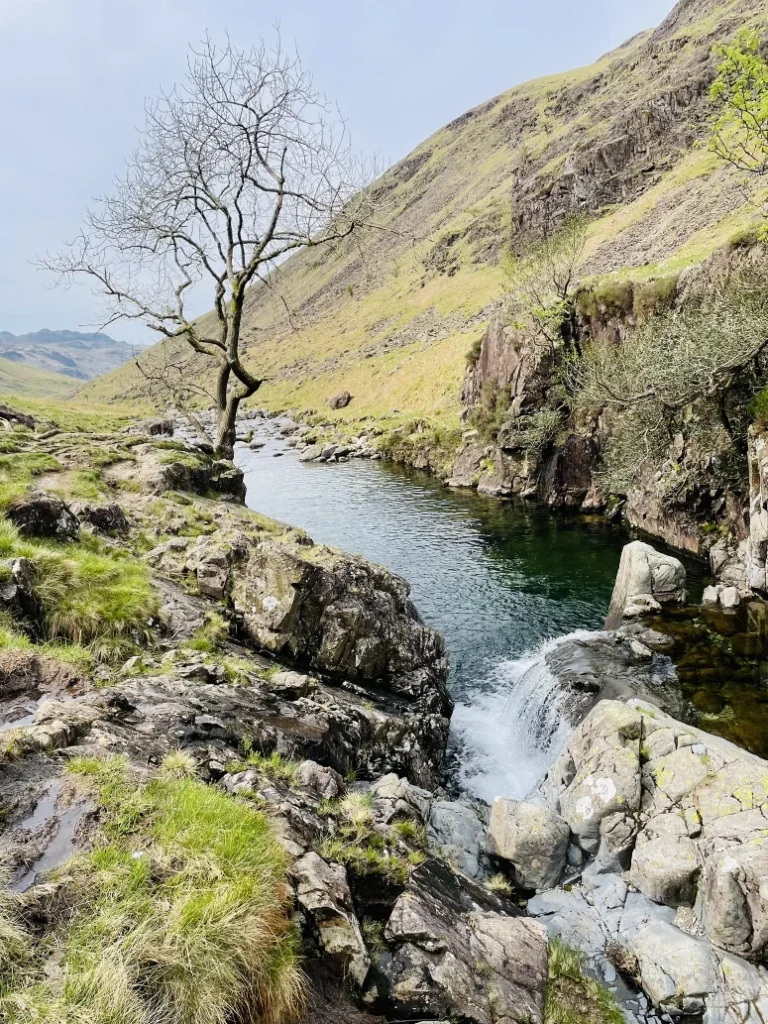 Clear pool and waterfall along the River Esk in Upper Eskdale