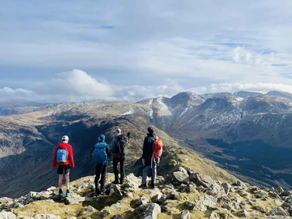 Group of walkers on ridge overlooking the North Ennerdale Skyline