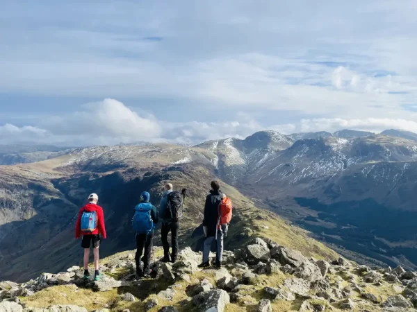 Group of walkers on ridge overlooking the North Ennerdale Skyline