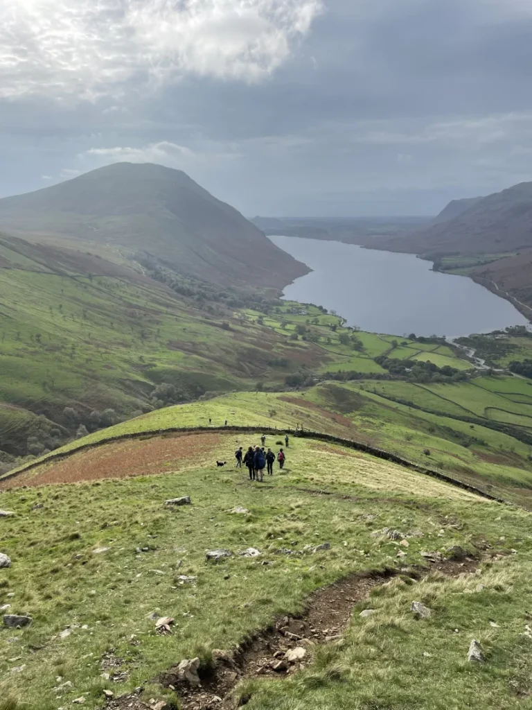 Hiker group on Lingmell ridge overlooking Wastwater in the Lake District