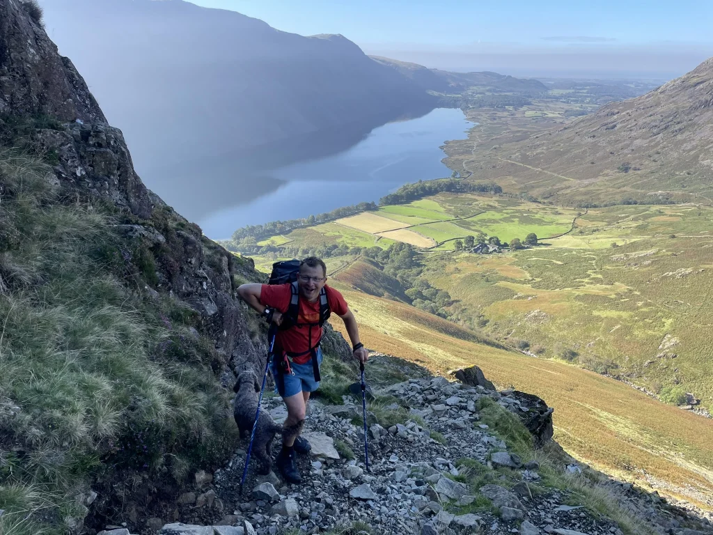 Walker climbing above the Wasdale Mosedale Horseshoe in the Lake District