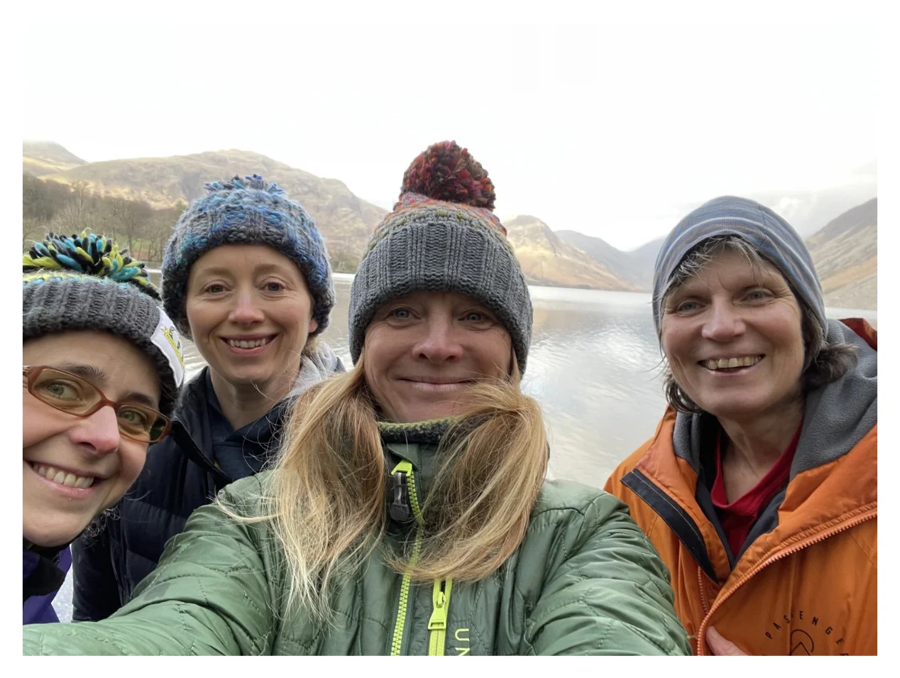 Women hikers taking a selfie during a guided walk in the Lake District