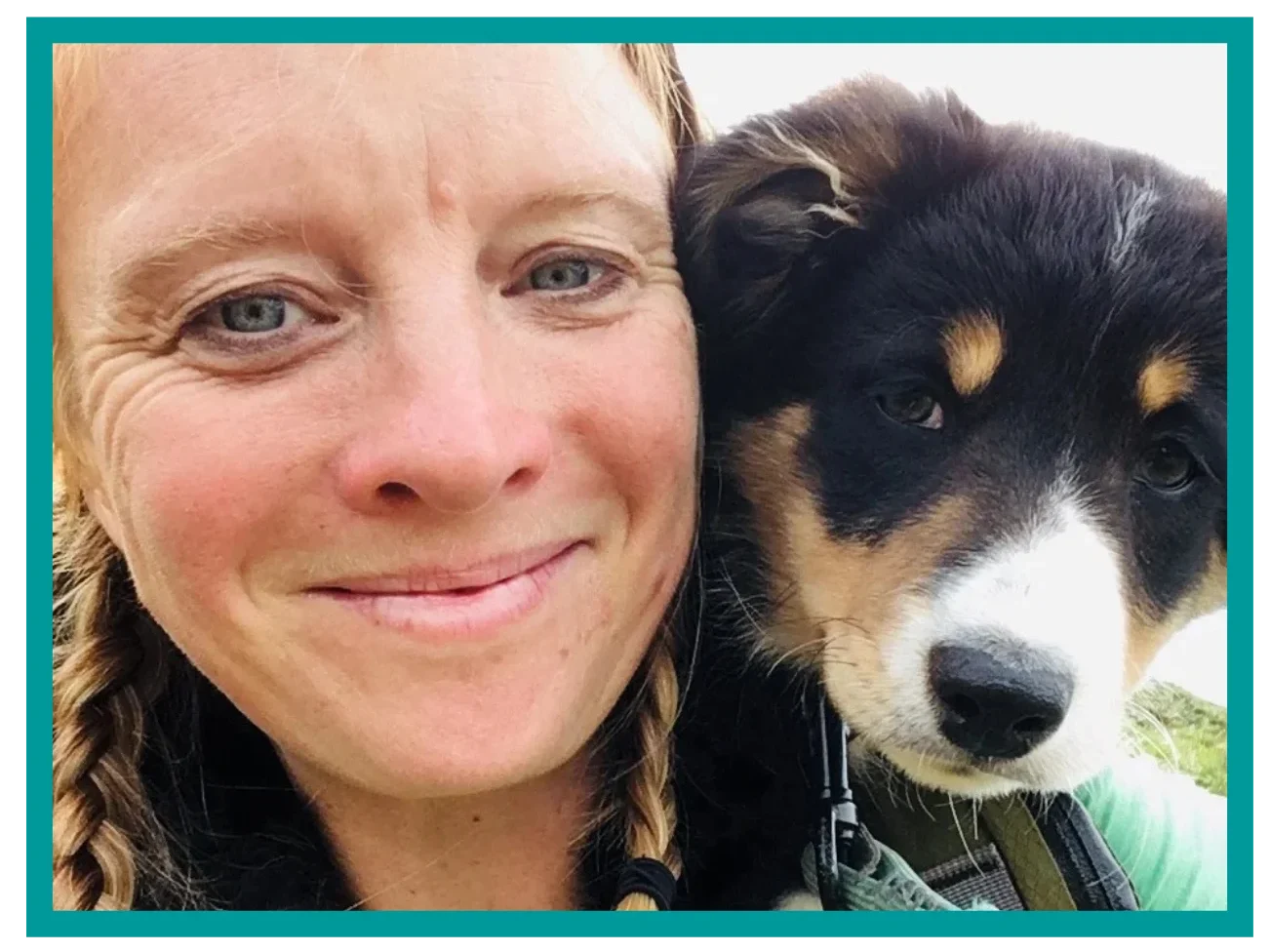 Way Out West guide smiling with Blea the dog outdoors